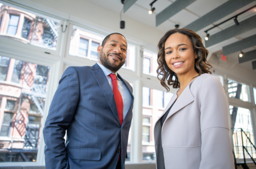 black man and woman in an office space